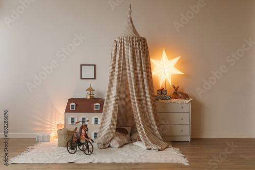 Close-up of a horse toy in front of a doll's house, tent teepee and chest of drawers with wrapped gifts in a child's bedroom photo