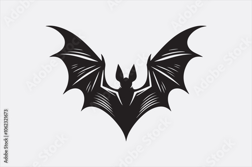 A black silhouette of a flying bat with outstretched wings.