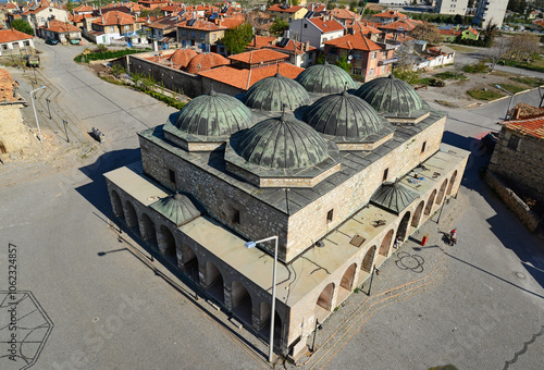 Esrefoglu Mosque and Complex, located in Beysehir, Konya, Turkey, was built in 1299. It consists of a mosque, covered bazaar, tomb, bath and madrasah. photo