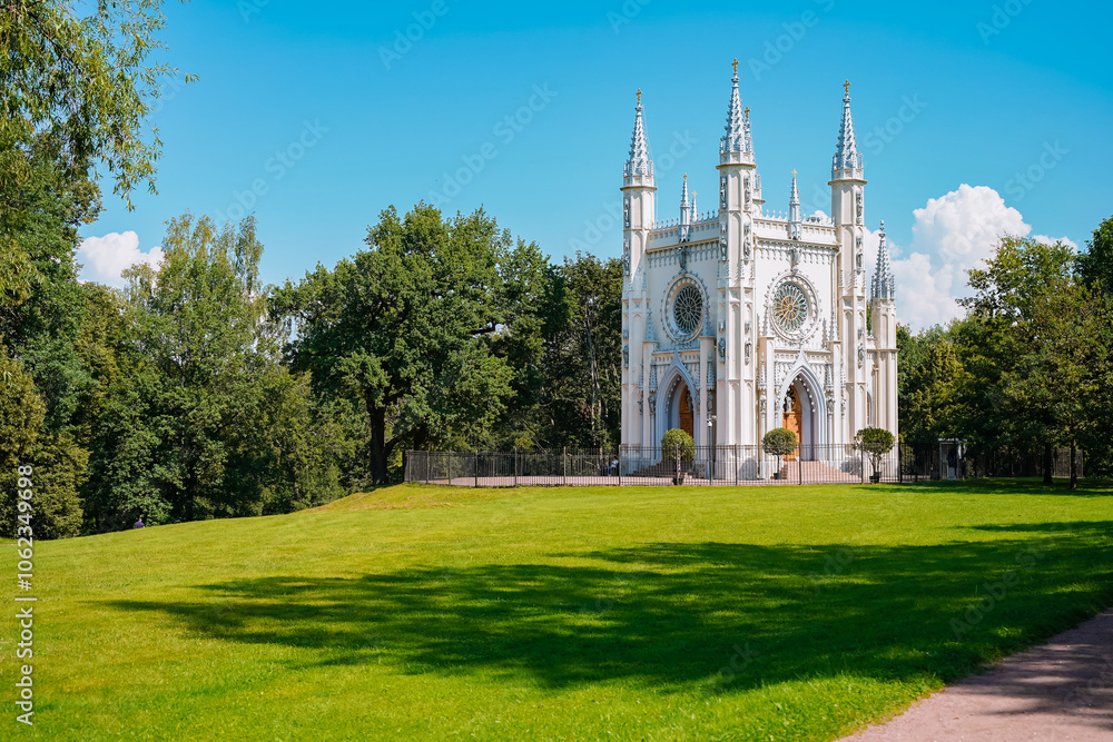 The Gothic Chapel in Peterhof, the Alexander Nevsky Church in the park. Saint Petersburg, Russia - 19 July 2024 The Gothic Chapel in Peterhof, the Alexander Nevsky Church in the park. Saint Petersburg, Russia - 19 July 2024