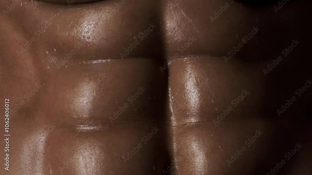 Six pack. Perfect abs, shoulders, and chest. Close up the Abs. Closeup torso. Ab. Muscular torso and ripped abs. Sexy male muscular body. Man with naked torso showing six pack abs. Six pack. Perfect abs, shoulders, and chest. Close up the Abs. Closeup torso. Ab. Muscular torso and ripped abs. Sexy male muscular body. Man with naked torso showing six pack abs.
