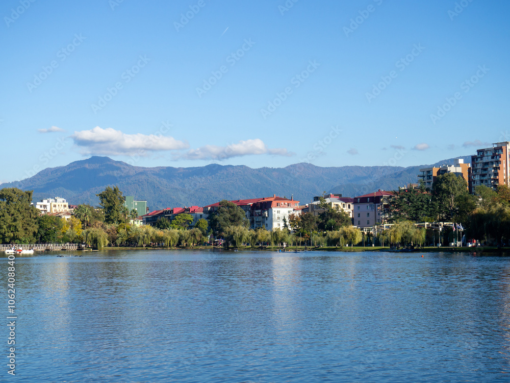 Obraz premium Lake in the mountainous area. Lake Nurigel in Batumi. Water surface, against the backdrop of the mountain.