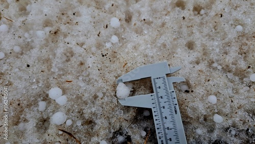 Hailstorm In Ontario, Canada With Snow On Ground