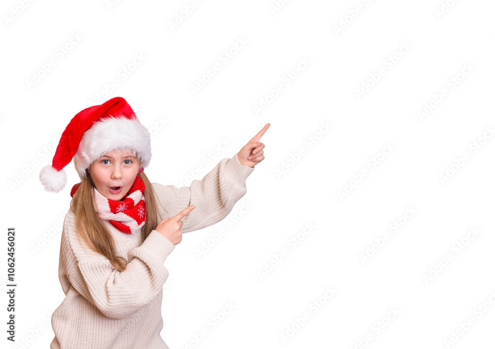 Little girl in Santa hat pointing to empty copy-space isolated on white background. Little girl in Santa hat pointing to empty copy-space isolated on white background.