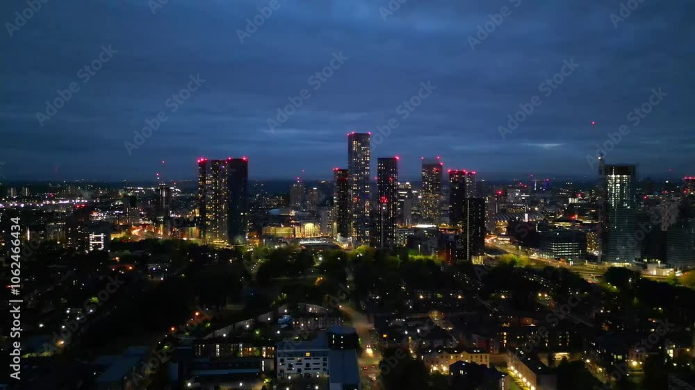 Aerial View of Illuminated Greater Manchester Central City During Cloudy Night, Northwest of England Great Britain. Captured During Midnight over Downtown of Manchester City of UK on May 4th, 2024 Aerial View of Illuminated Greater Manchester Central City During Cloudy Night, Northwest of England Great Britain. Captured During Midnight over Downtown of Manchester City of UK on May 4th, 2024