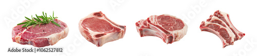 Four cuts of fresh meat with herbs, isolated on a white background. photo