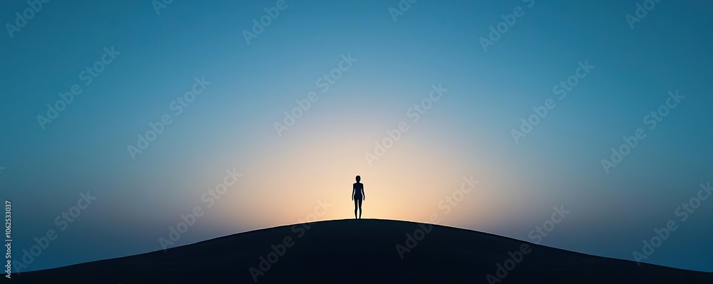 Silhouette of a person standing on a hill against a sunset background. Silhouette of a person standing on a hill against a sunset background.