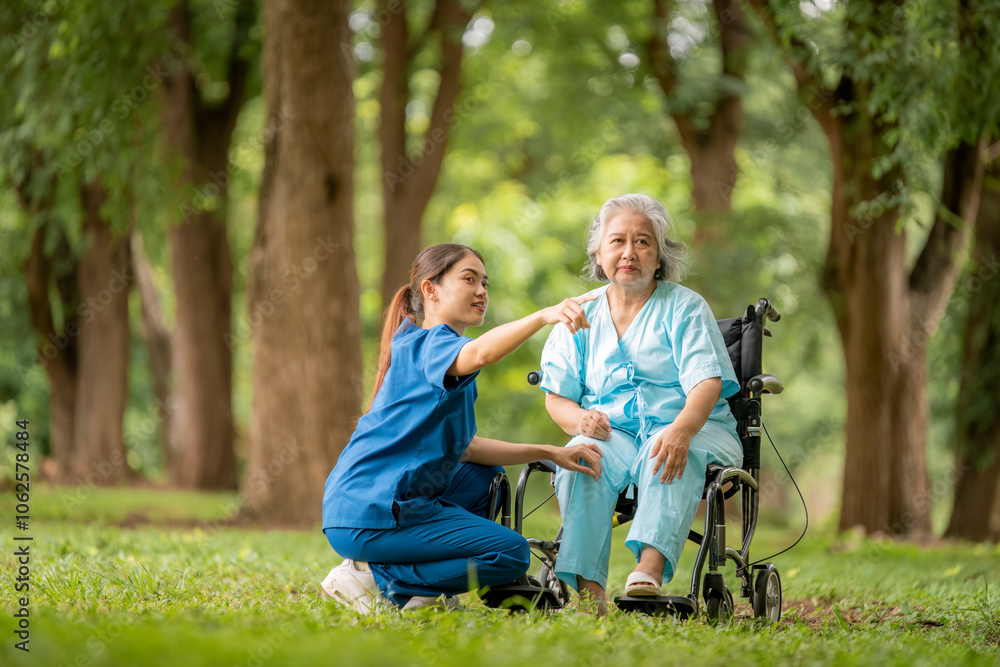 Fototapeta premium Healthcare or physical therapy nurse is helping elderly appears engaged in an exercise routine caregiver individuals focused on rehabilitation exercises elder concept.