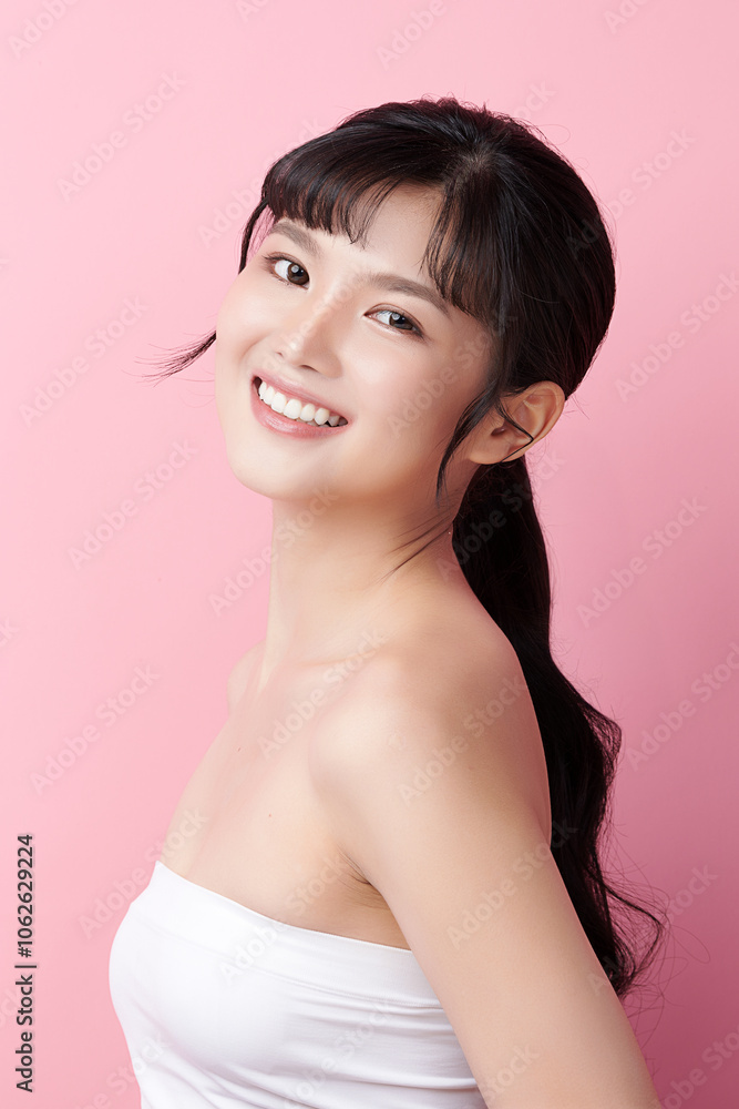 Obraz premium Beautiful young asian woman with clean fresh skin on pink background, Face care, Facial treatment, Cosmetology, beauty and spa, Asian women portrait.
