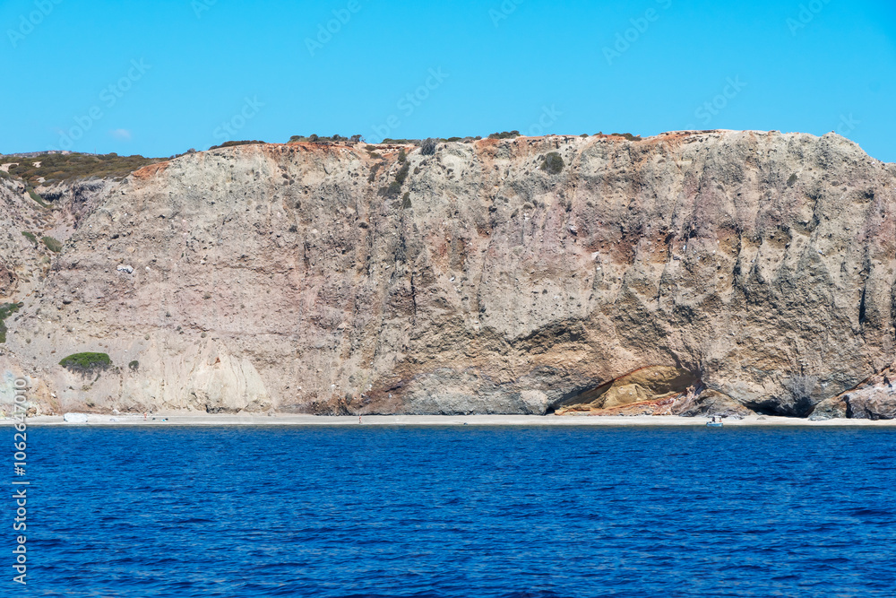 Rocky wall overlooking the sea in Milos, Cyclades Islands. Greece. Rocky wall overlooking the sea in Milos, Cyclades Islands. Greece.