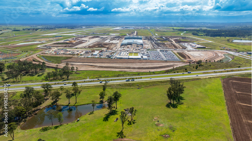 Drone aerial photograph of the new Western Sydney International Airport cargo precinct currently under construction in a large industrial development in greater Sydney, NSW Australia.