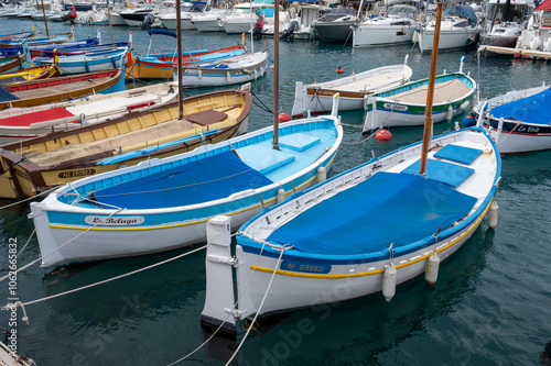 Traditional colorful fishing boats, called pointu in French. in Nice Port, Nice, France on sunny summer day.