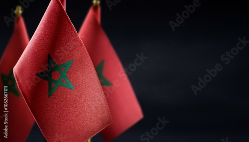 小さなモロッコの国旗と暗い背景。(Morocco flag and dark background.)
 photo