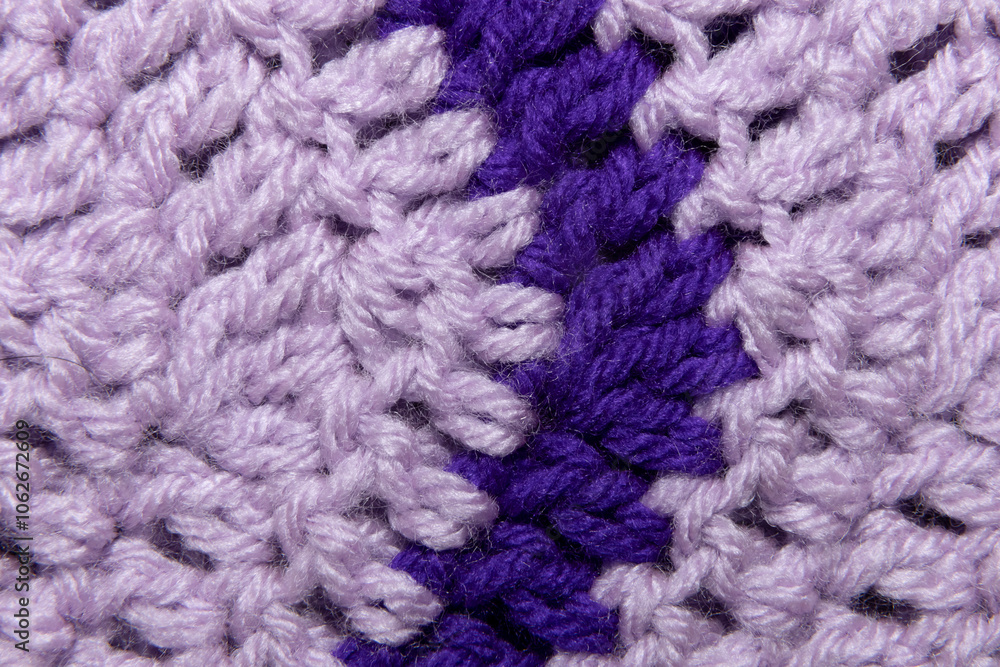 close-up of grandma's lilac purple and royal purple, blanket with double crochet, arrow or point, crocheted or knitted, grandma's house, turn or corner stitching from a top view close-up of grandma's lilac purple and royal purple, blanket with double crochet, arrow or point, crocheted or knitted, grandma's house, turn or corner stitching from a top view