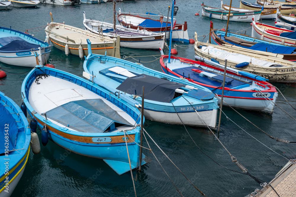 Traditional colorful fishing boats, called pointu in French. in Nice Port, Nice, France on sunny summer day. Traditional colorful fishing boats, called pointu in French. in Nice Port, Nice, France on sunny summer day.