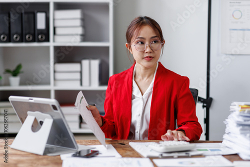 Business Documents, Auditor businesswoman checking searching document legal prepare paperwork or report for analysis TAX time,accountant Documents data contract partner deal in workplace office
