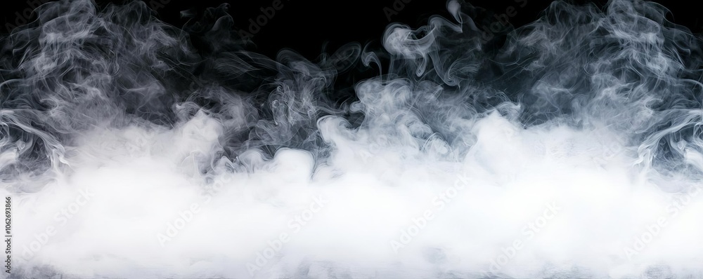 Fototapeta premium Smoke or fog on a black background creating a mysterious atmosphere. Ideal for artistic designs, visuals and abstract compositions.