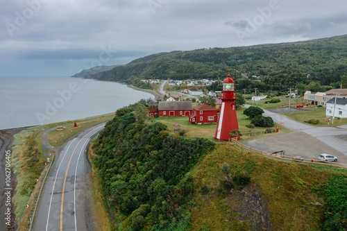 La Martre Lighthouse along the coastline of the St Lawrence River on the Gaspé Peninsula, La Martre, Quebec, Canada.