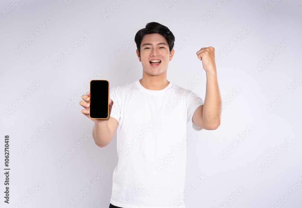 Portrait of young asian man using phone on white background
Portrait of young asian man using phone on white background