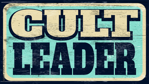Aged and worn cult leader sign on wood