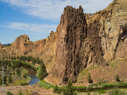 A mountain range with a river running through it photo