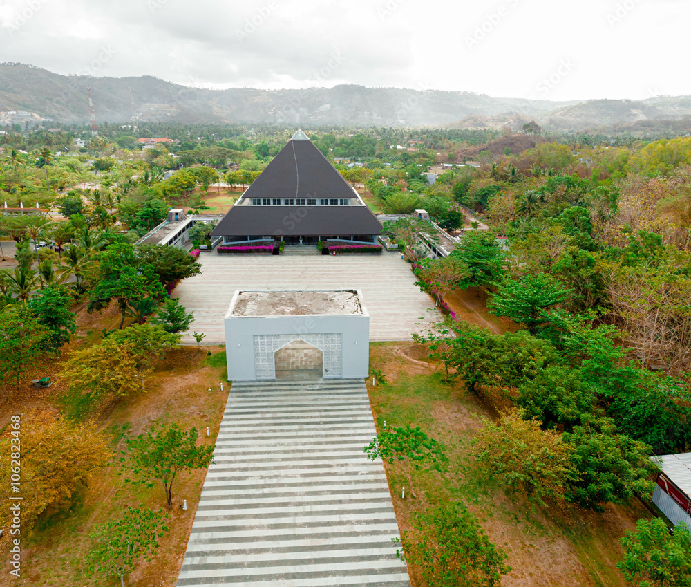 Aerial drone view of unique Nurul Bilad Mosque or Masjid Nurul Bilad in Kuta Mandalika, Lombok, Indonesia Aerial drone view of unique Nurul Bilad Mosque or Masjid Nurul Bilad in Kuta Mandalika, Lombok, Indonesia