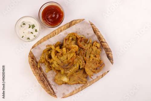 Onion Bhaji or Kanda Bhajji or Pyaj Pakode is Fried Onion Pakora. photo