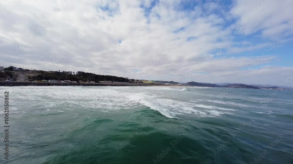 FPV Drone View of Surfable Beach in Pohang, South Korea FPV Drone View of Surfable Beach in Pohang, South Korea