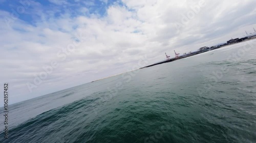 FPV Drone View of Surfable Beach in Pohang, South Korea