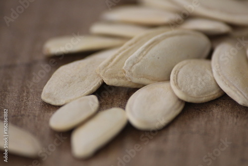 pumpkin seeds standing on wooden table