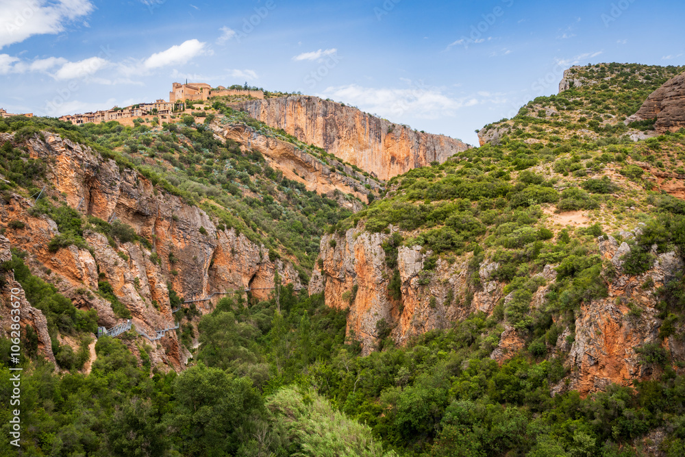 Pasarelas del Vero, walkways and footbridges along a scenic gorge with turquoise water in Alquézar, Huesca, Spain Pasarelas del Vero, walkways and footbridges along a scenic gorge with turquoise water in Alquézar, Huesca, Spain