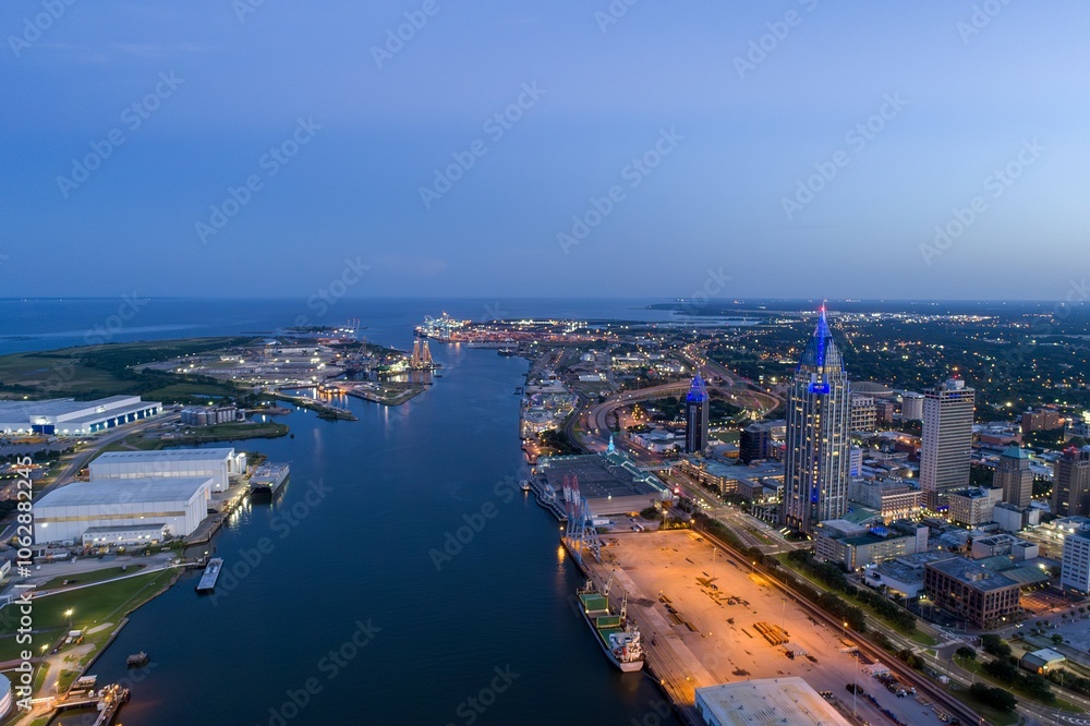 Fototapeta premium Downtown Mobile waterfront skyline at sunset