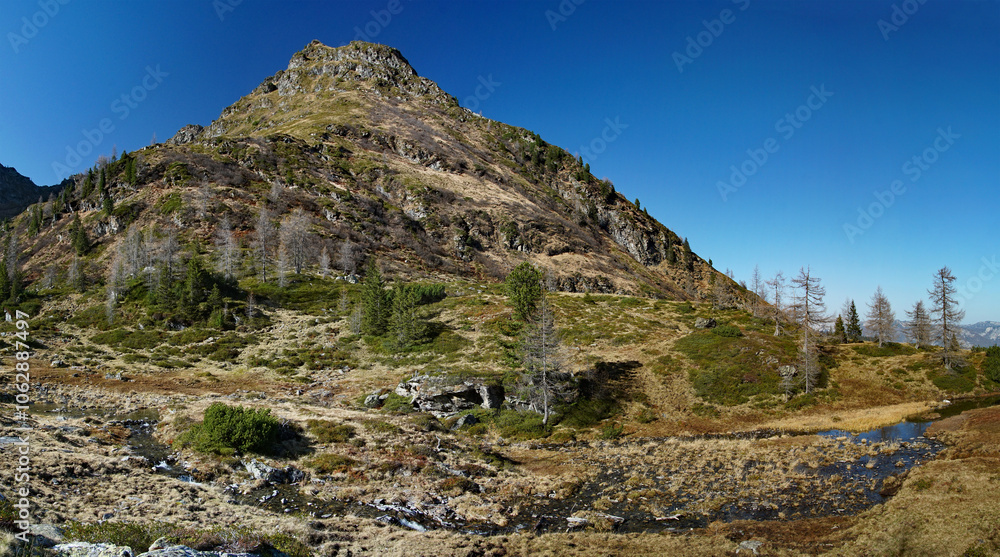 Naklejka premium Herbstausklang am Moarsee in den Schladminger Tauern
