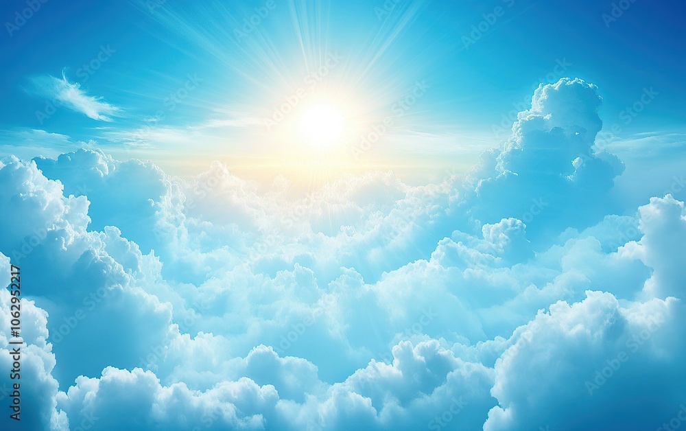 Stunning view of fluffy white clouds in a bright blue sky, with sunlight shining through. Stunning view of fluffy white clouds in a bright blue sky, with sunlight shining through.