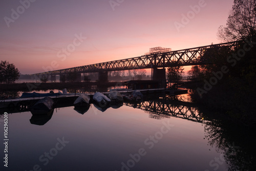 Obraz na płótnie Becca Bridge landscape sun sunset river Ticino silhouette nature w salonie