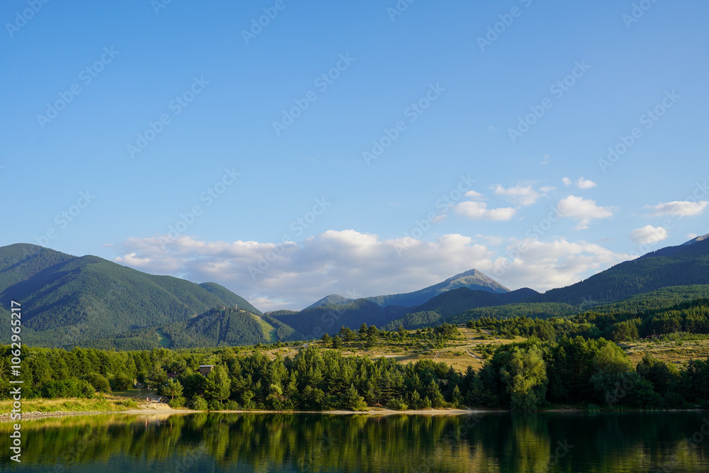 Belizmata Dam with a backdrop of the Pirin Mountains, Bansko, Bulgaria Belizmata Dam with a backdrop of the Pirin Mountains, Bansko, Bulgaria