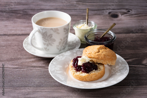 Tea time  with homemade scone 1 -  wood backbround 1 photo