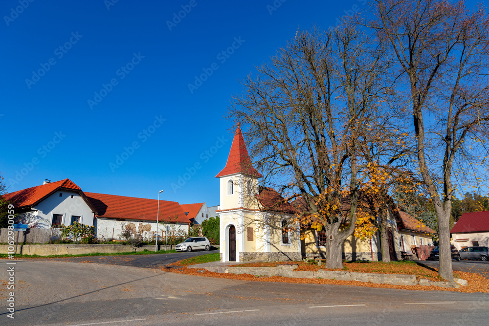 A small chapel in a Czech village Breznice on an autumn day.