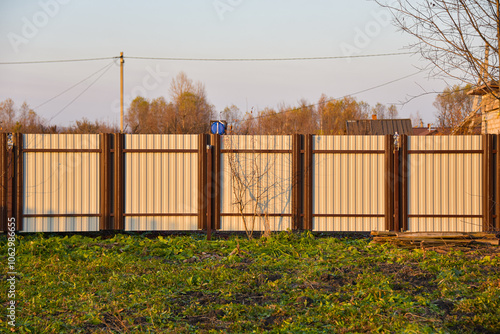 Beautiful metal fence during sunset.