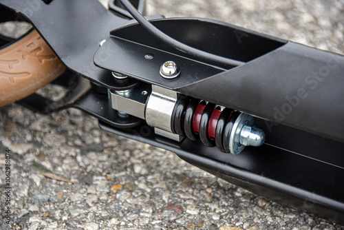 Scooter suspension with spring. Close-up.