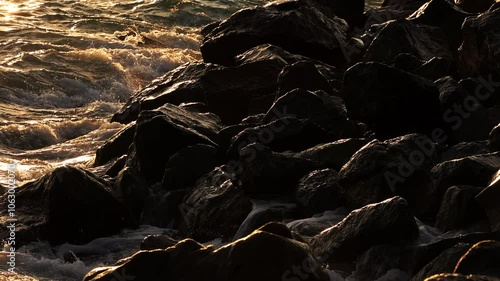 sea ​​waves beat against the rocks