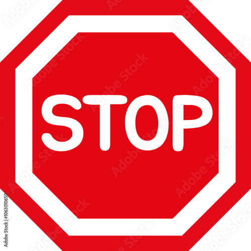 Red octagonal stop sign on the road signaling caution and safety