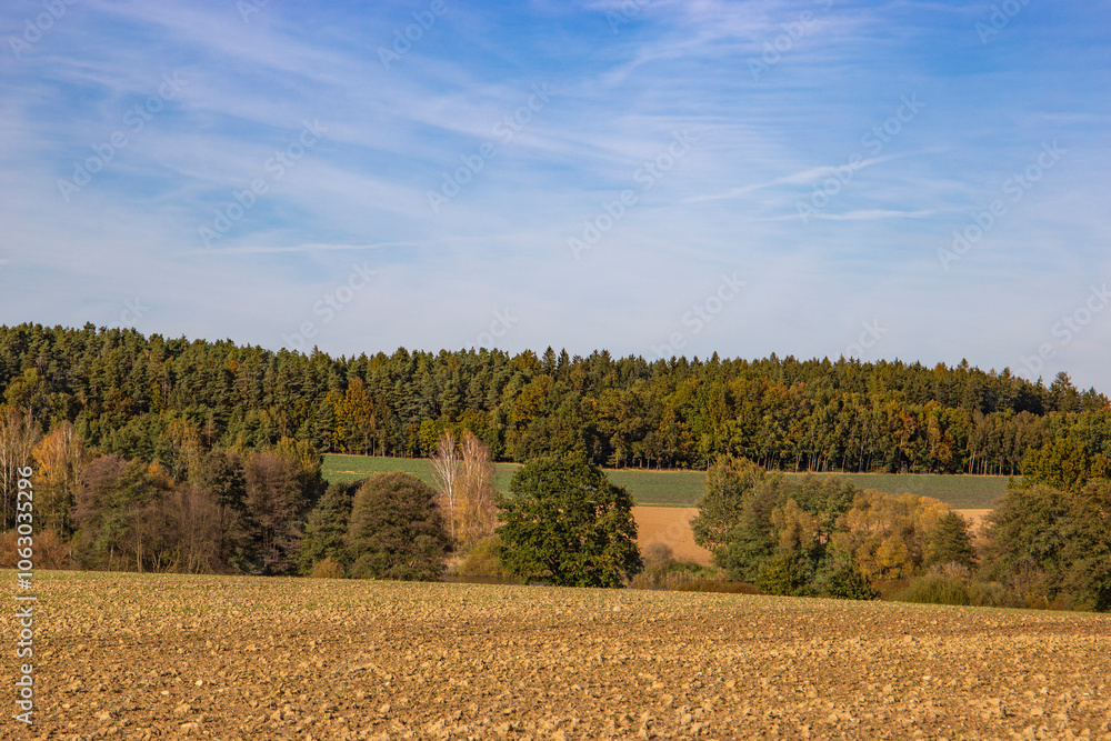 An autumn landscape with fields and forests in Central Europe.