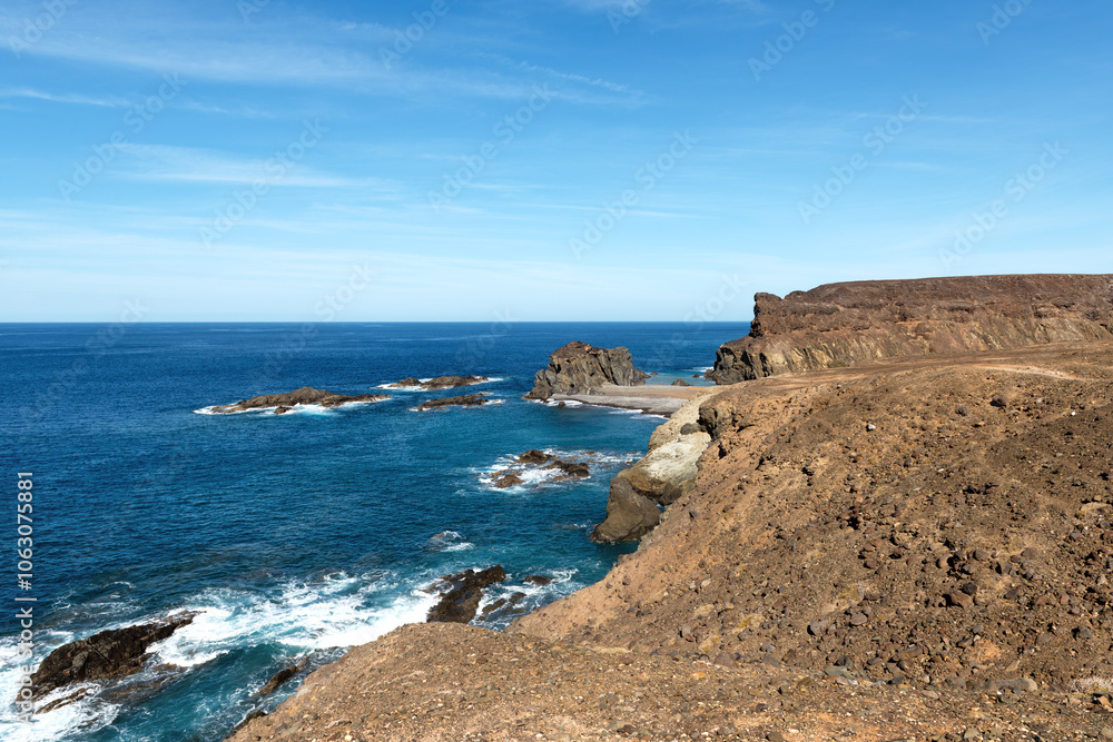 Fabulous landscape of wavy Atlantic ocean on Pena Horadada beach, Betancuria, Fuerteventura, Canary Islands, Spain, Atlantic, Europe Fabulous landscape of wavy Atlantic ocean on Pena Horadada beach, Betancuria, Fuerteventura, Canary Islands, Spain, Atlantic, Europe