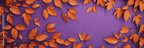 Background of violet with dry orange metallic leaves forming a captivating pattern, seasonal
