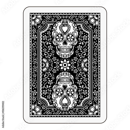 Back of playing card with ornate black skull pattern, intricate decorative border.
