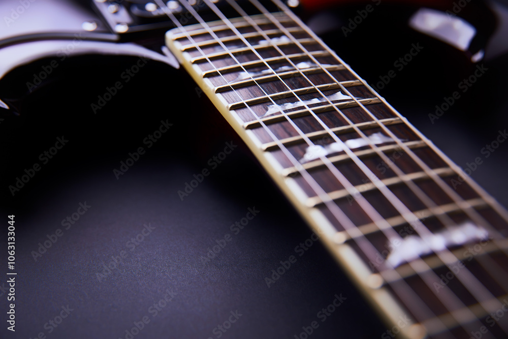 Fototapeta premium Fretboard of modern electric guitar. Close up.