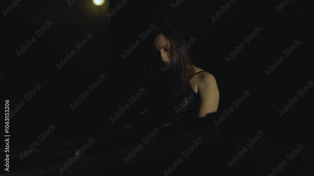 Woman playing piano. Cinematic video. Woman playing piano. Cinematic video.
