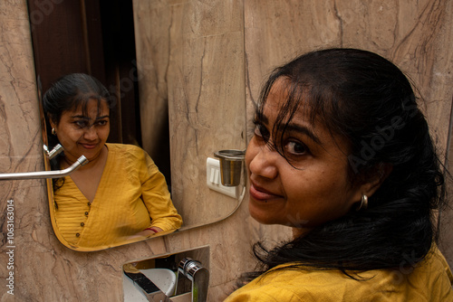 Young Woman with Eerie Reflection in Mirror – Ghost Concept