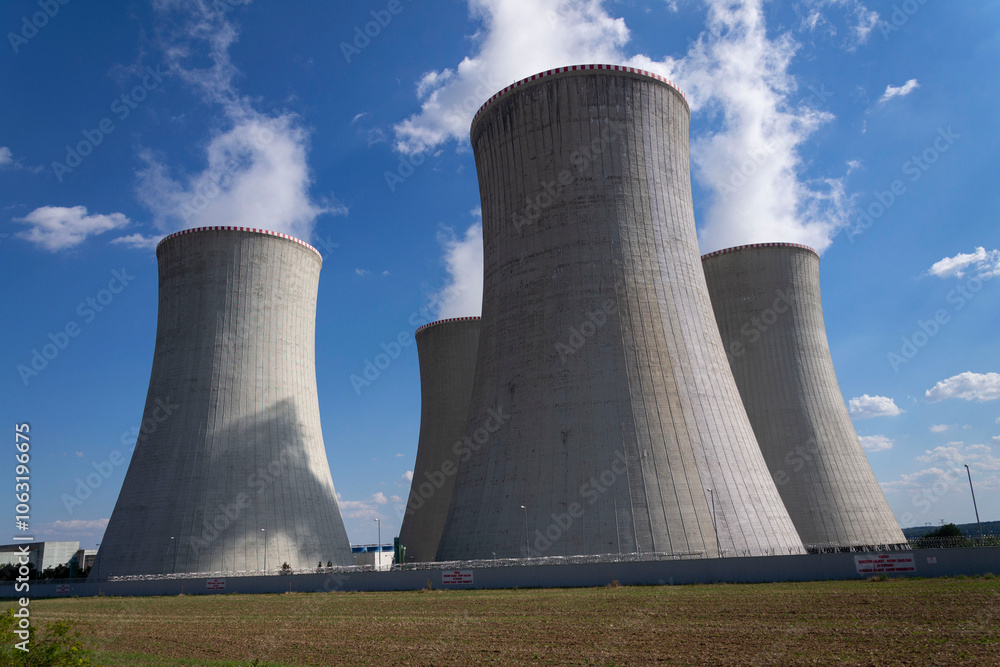 Cooling towers at nuclear power plant, energy self-sufficiency, greenhouse emission reduction and global warming concept, Dukovany, Czech Republic Cooling towers at nuclear power plant, energy self-sufficiency, greenhouse emission reduction and global warming concept, Dukovany, Czech Republic
